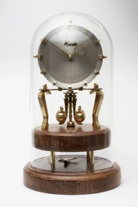 Horologist Johannesburg restoring vintage clock. Clock repair Johannesburg